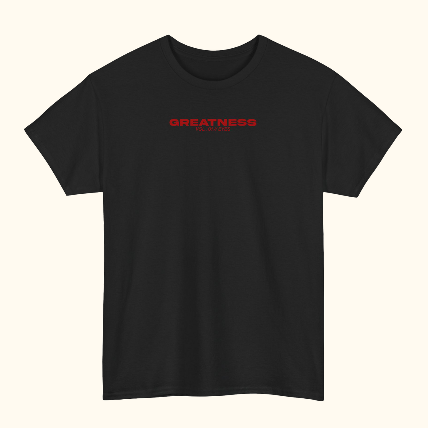 Black t-shirt with red text 'GREATNESS' on the chest.